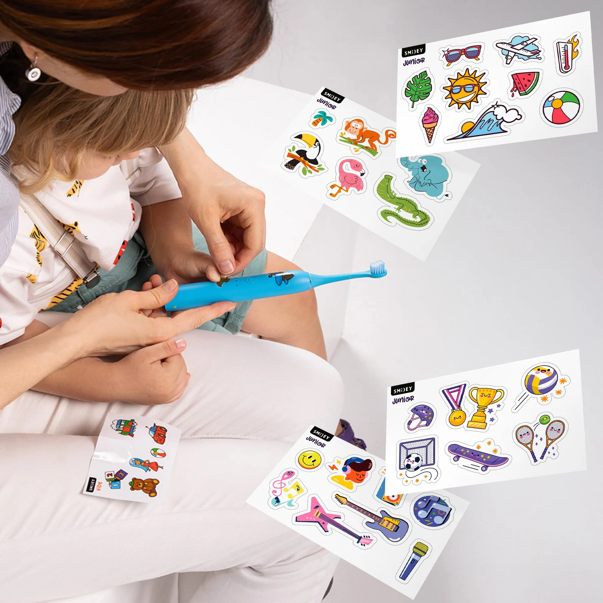 SMILEY Junior Elektryczna szczoteczka do zębów dla dzieci | Ultradźwiękowe szczoteczki soniczne do zębów | Szczoteczka do zębów dla dzieci i akcesoria: kabel USB-C i zestaw naklejek